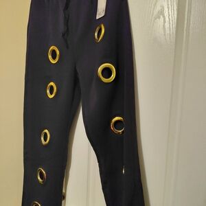 Stylish Black Pants with Gold Ring Accents